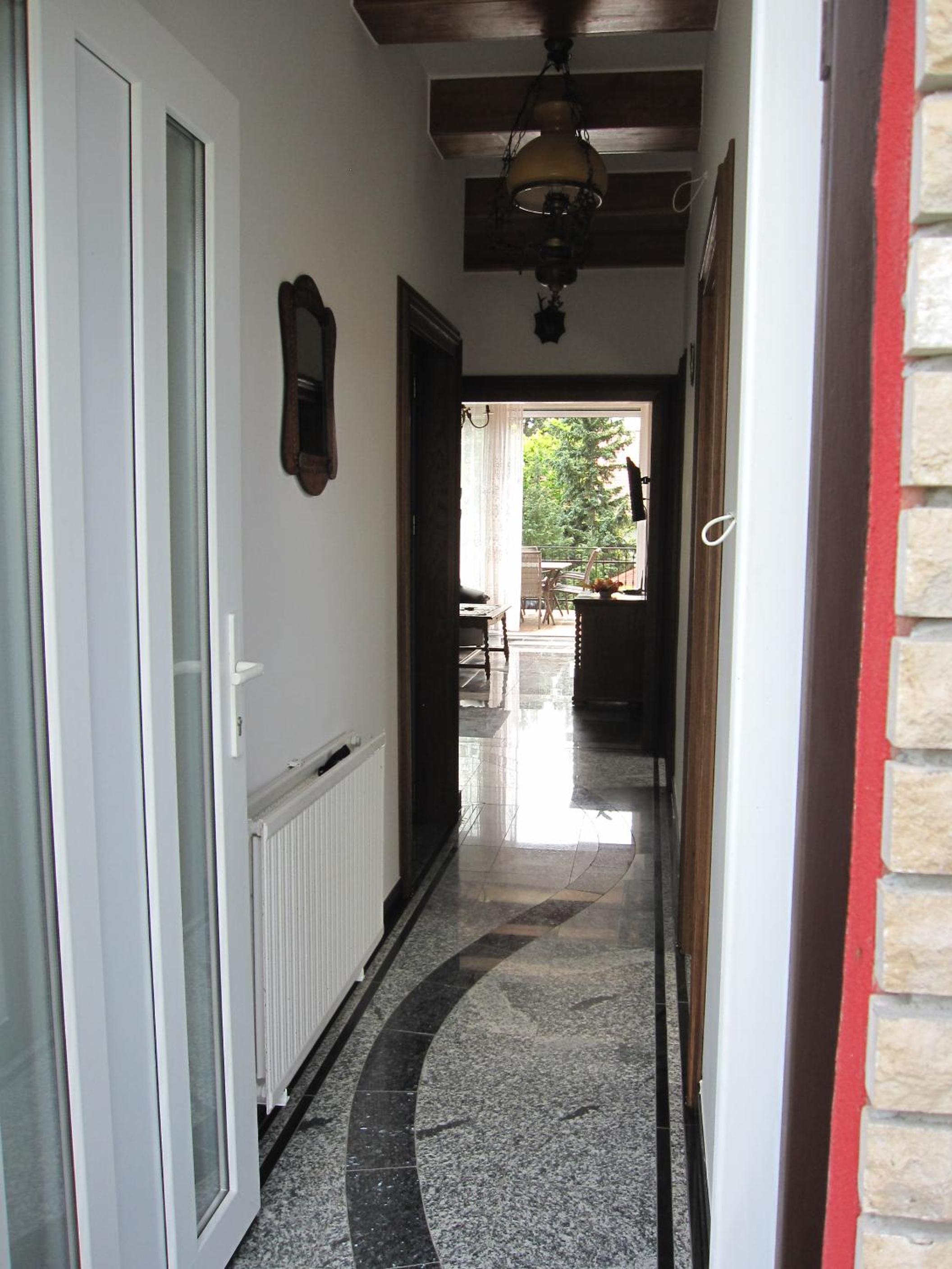 Three-Bedroom Apartment with Balcony photo 2