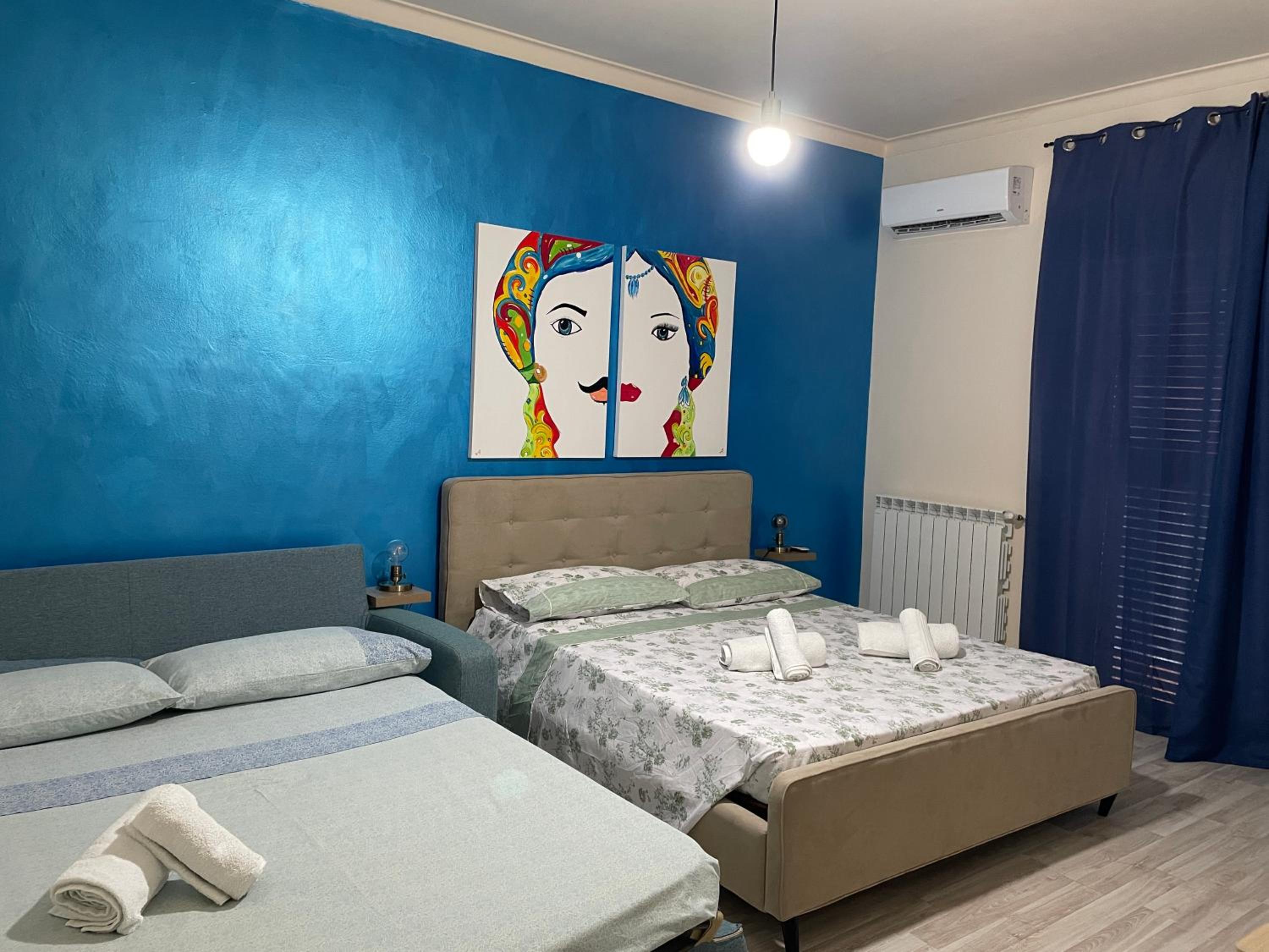 Quadruple Room with Private Bathroom