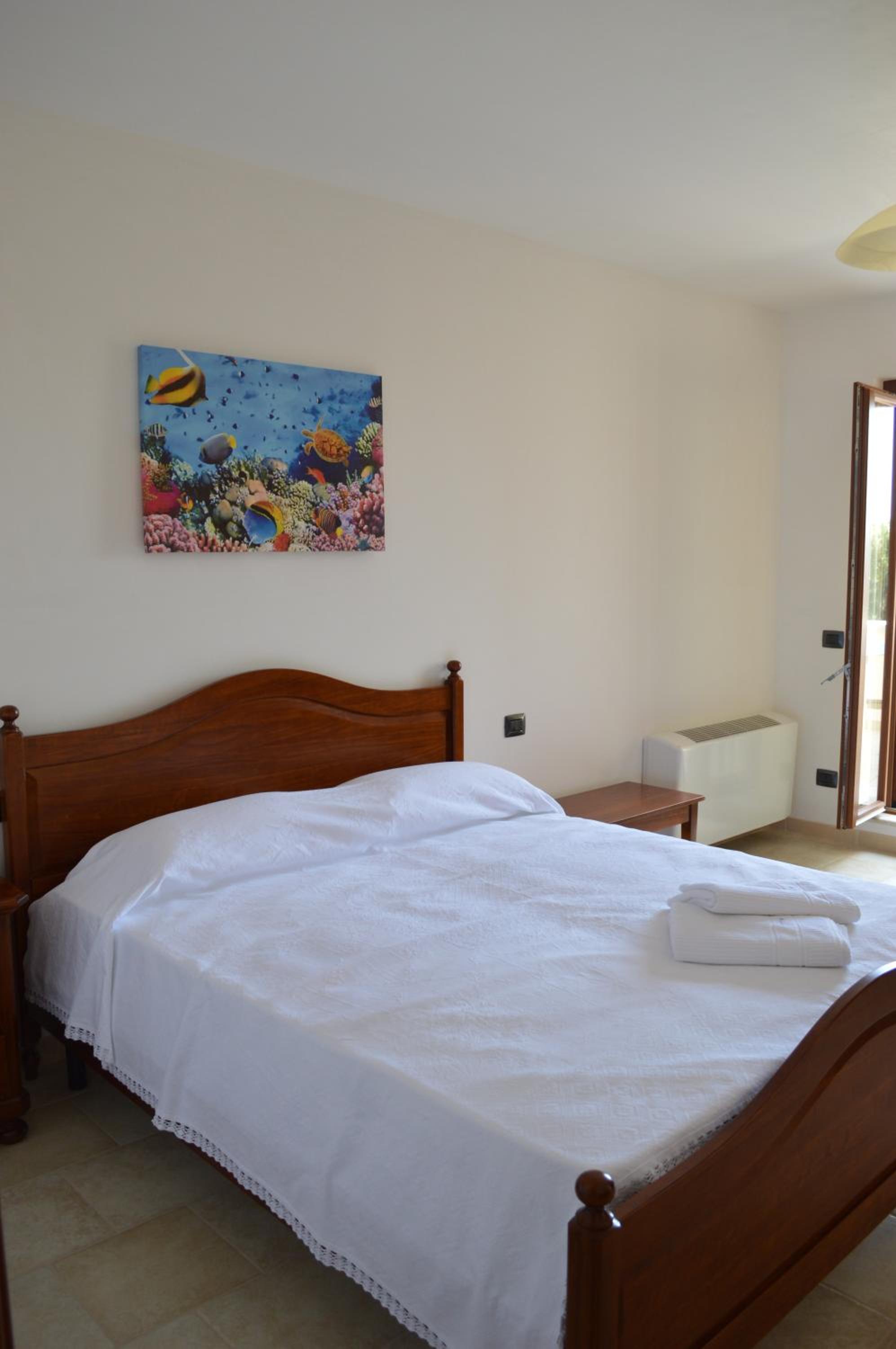 Superior Triple Room with Terrace and Sea View - Photo 1