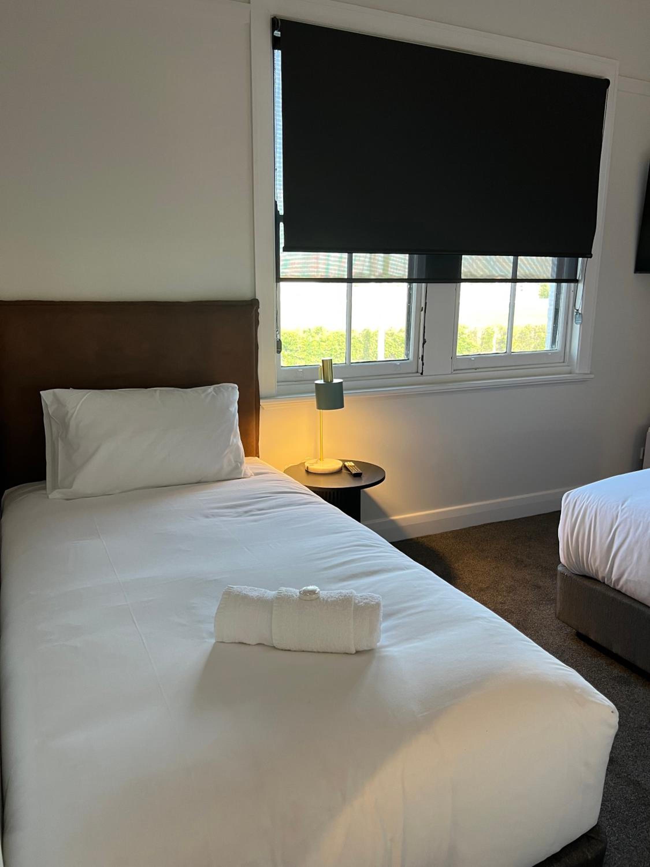 Basic Triple Room with Shared Bathroom