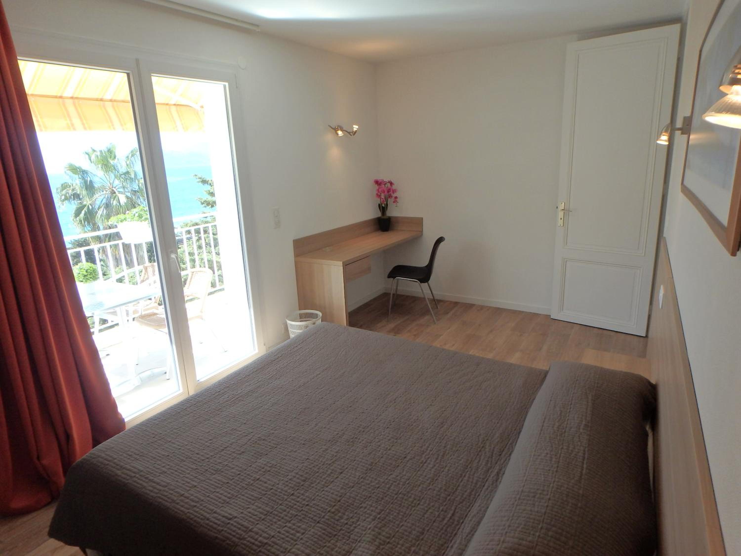 Two-Bedroom Apartment with Terrace (4 Persons - Sea View - Second Floor)