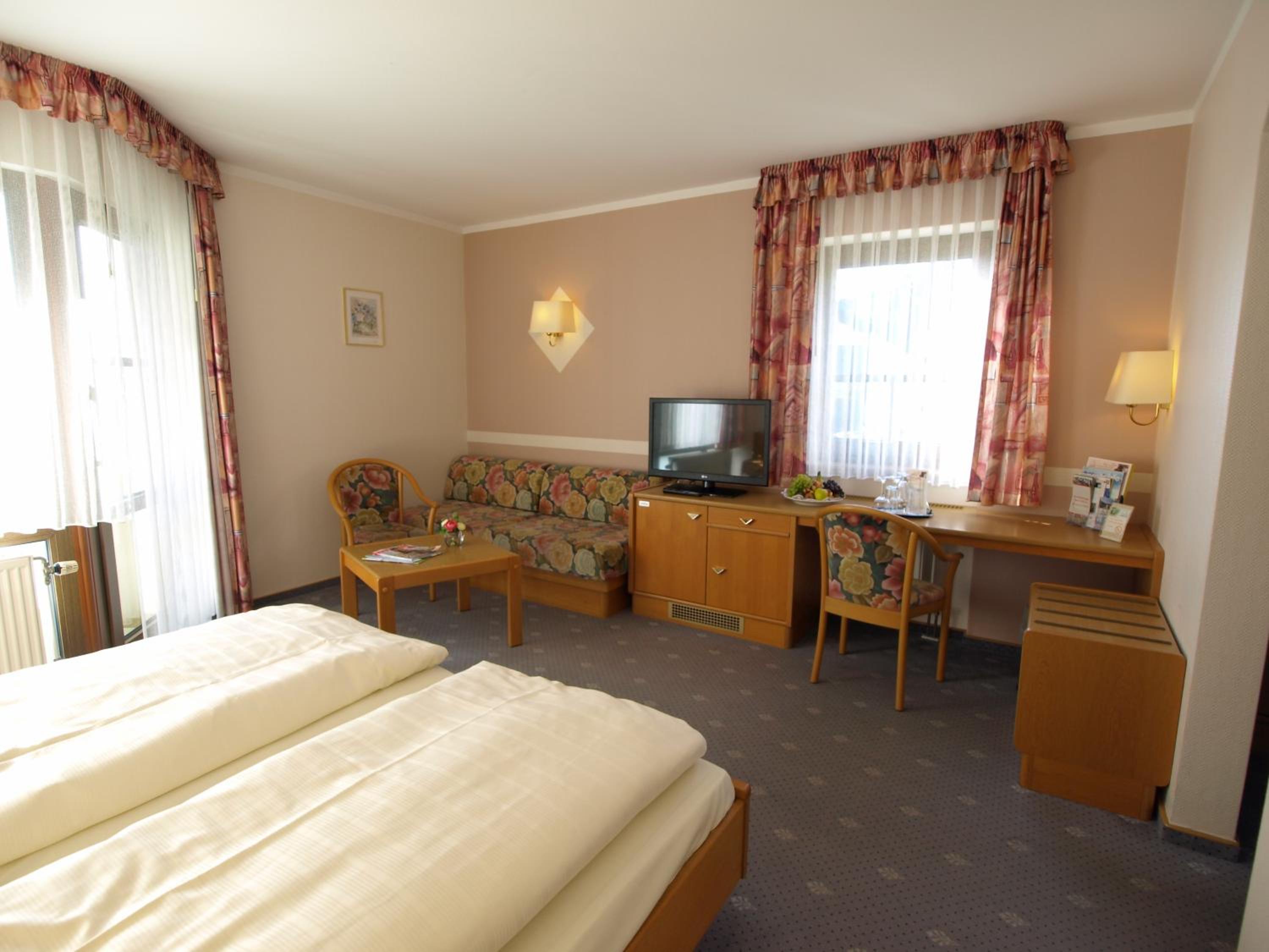 Triple Room with Balcony - Photo 1