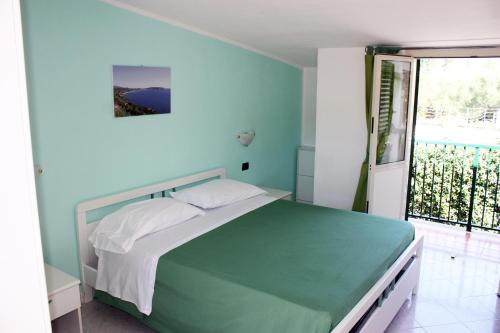 Triple Room with Balcony (2 Adults + 1 Child)