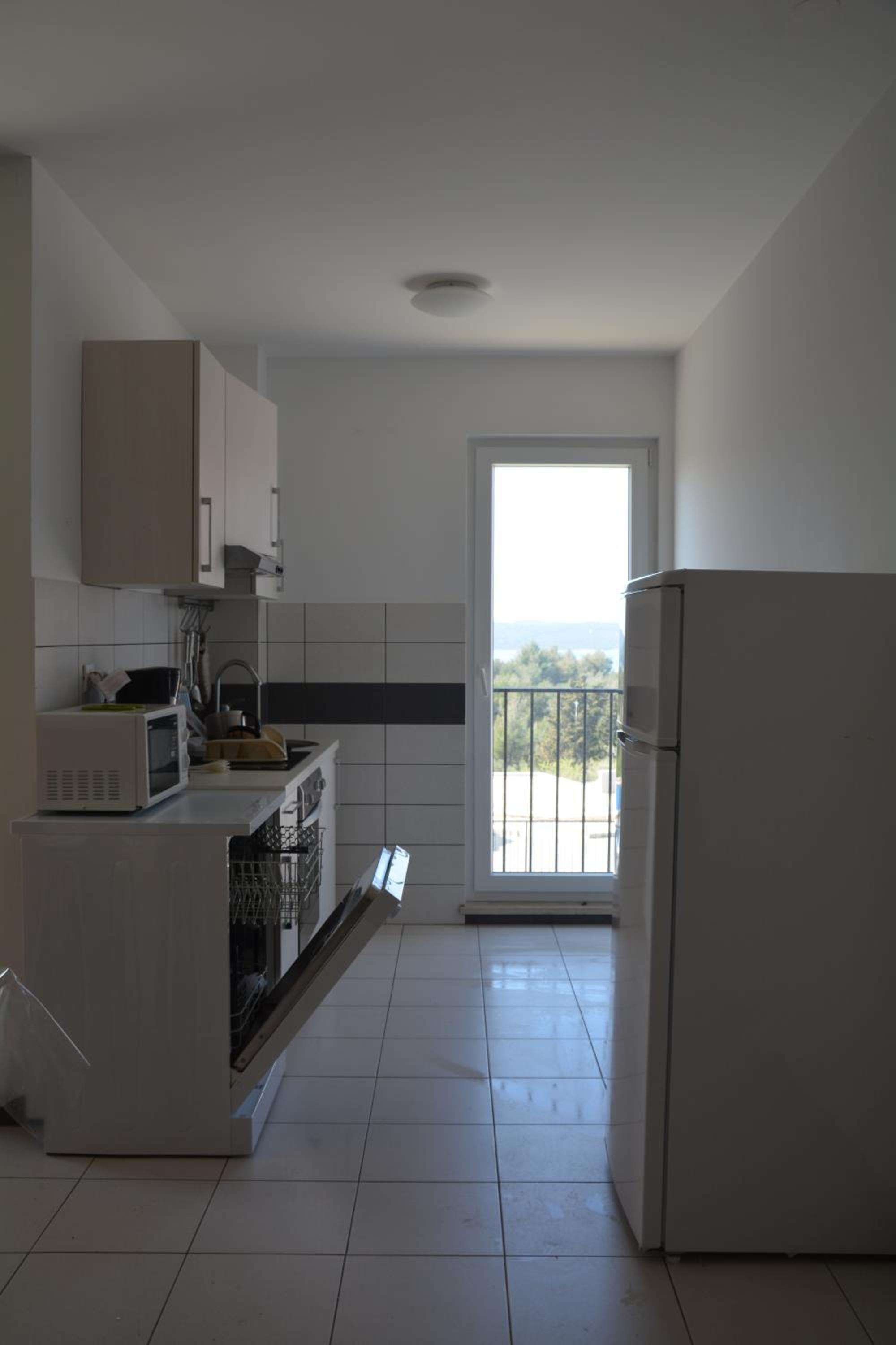 Comfort Two-Bedroom Apartment with Balcony and Sea View - Photo 16