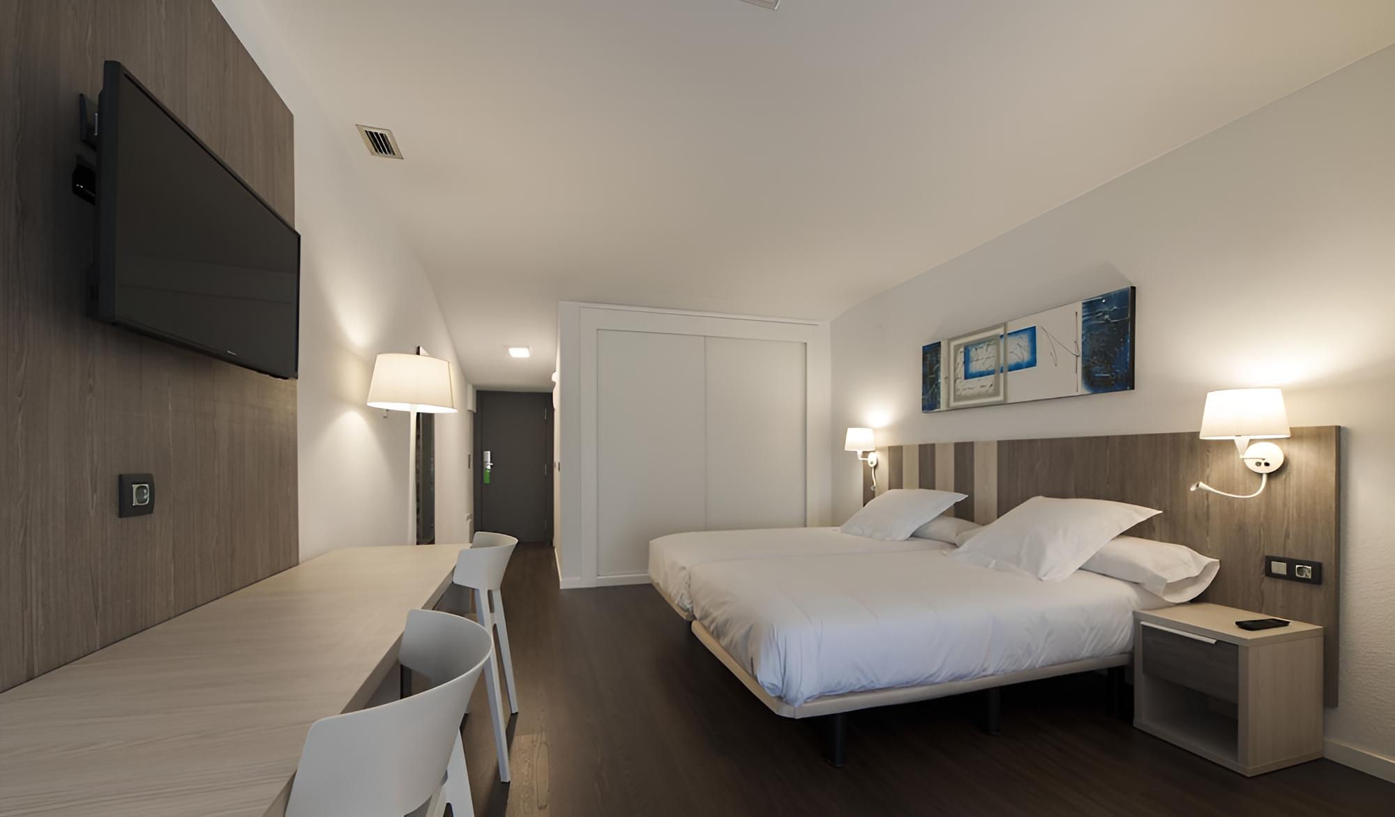 Triple Room (2 Adults + 1 Child)