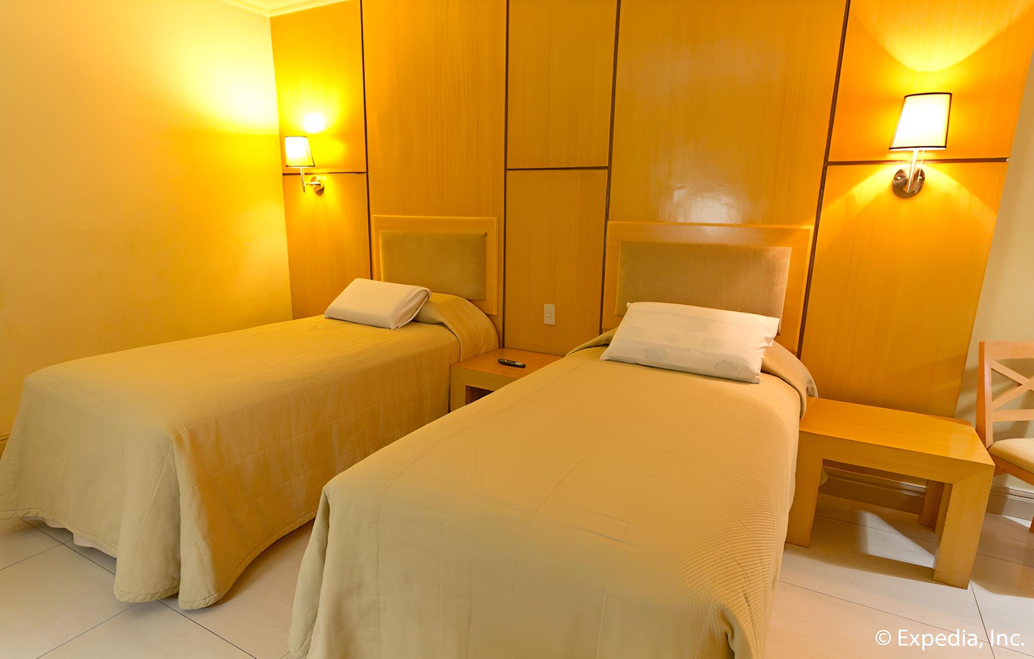 hotel room with two beds and one desk? it looks like the other