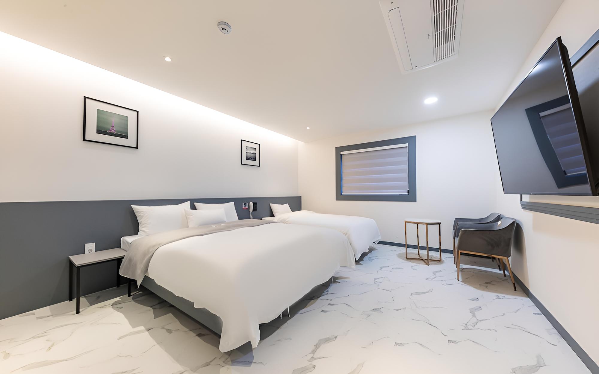 Room (Twin Room (All rooms have 65-inch TVs)