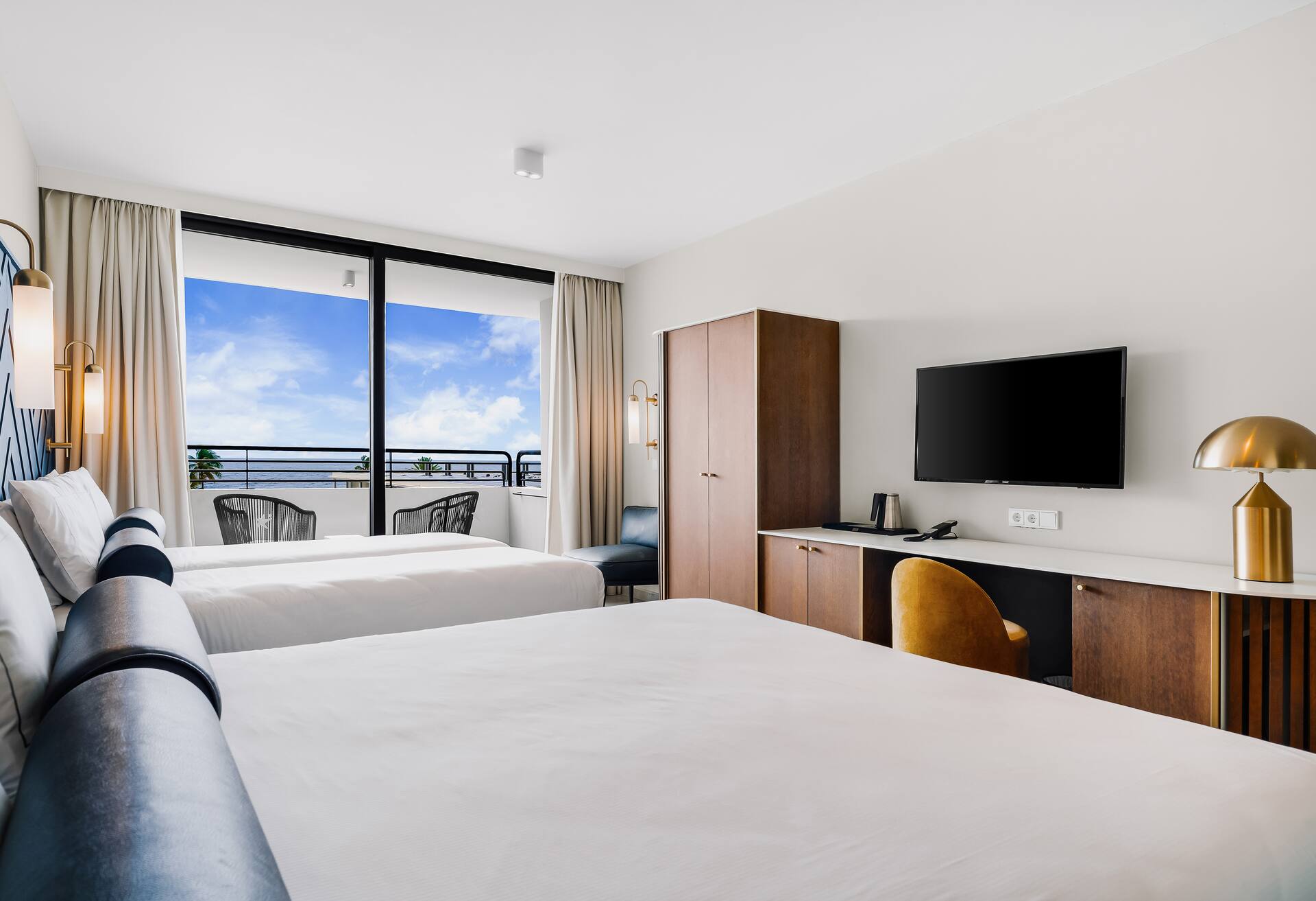 Oceanview-1 King and 2 Single Beds Guest Room thumbnail 6